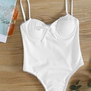 White one piece suit